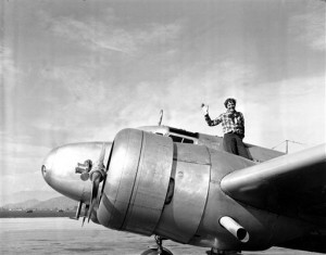 Amelia Earhart waves from the Electra (AP Photo, file)